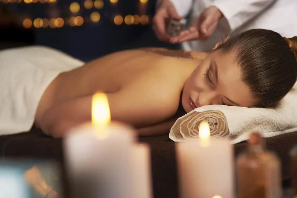 A moman relaxes during a massage at a Vermont spa weekend.