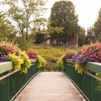 A footbridge framed with flower boxes in Wilmington VT