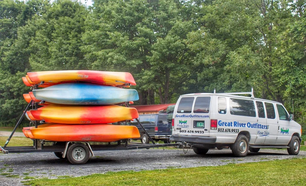 The kayak and canoe transport vehicle for Great River Outfitters.