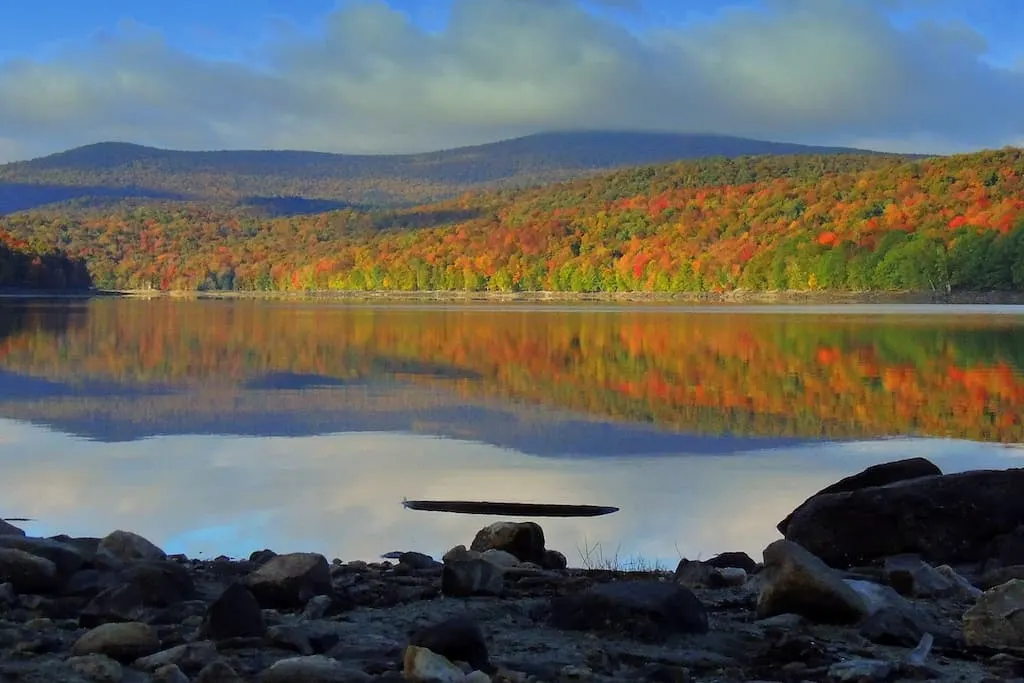 fall foliage on the shores of Lake Whitingham in Wilmington, Vermont