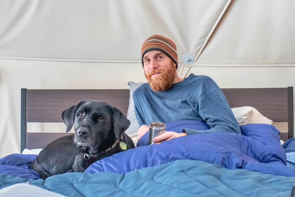 Eric and Flynn snuggled up in the bed of the dome.