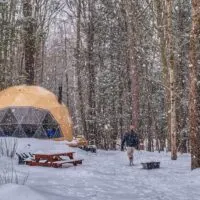 a geodesic dome in Putney Vermont, covered with snow