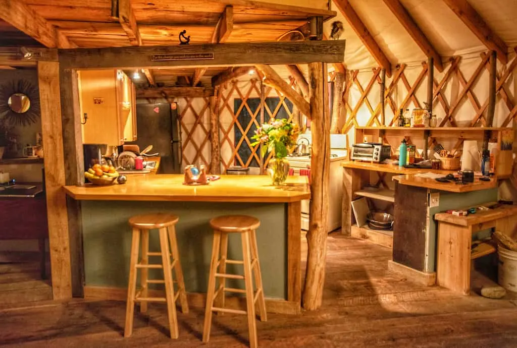 The kitchen inside a yurt for rent in Bristol, Vermont.