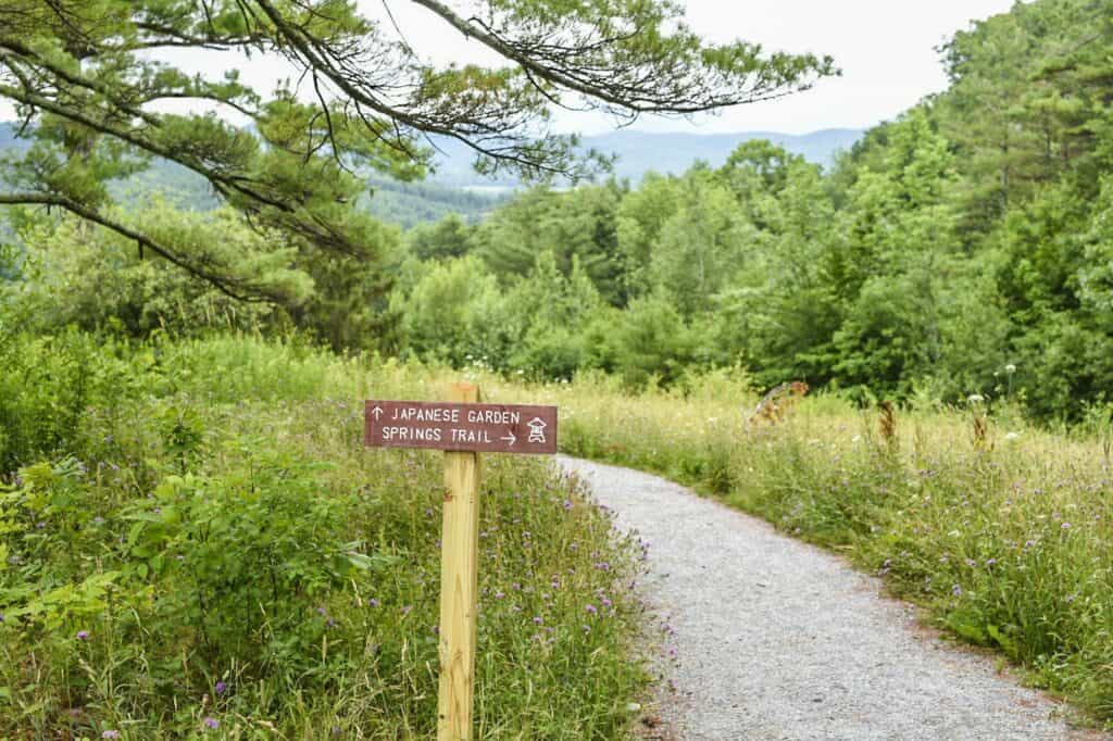 A sign pointing the way to the Japanese Garden at Taconic Mountain Ramble State Park.