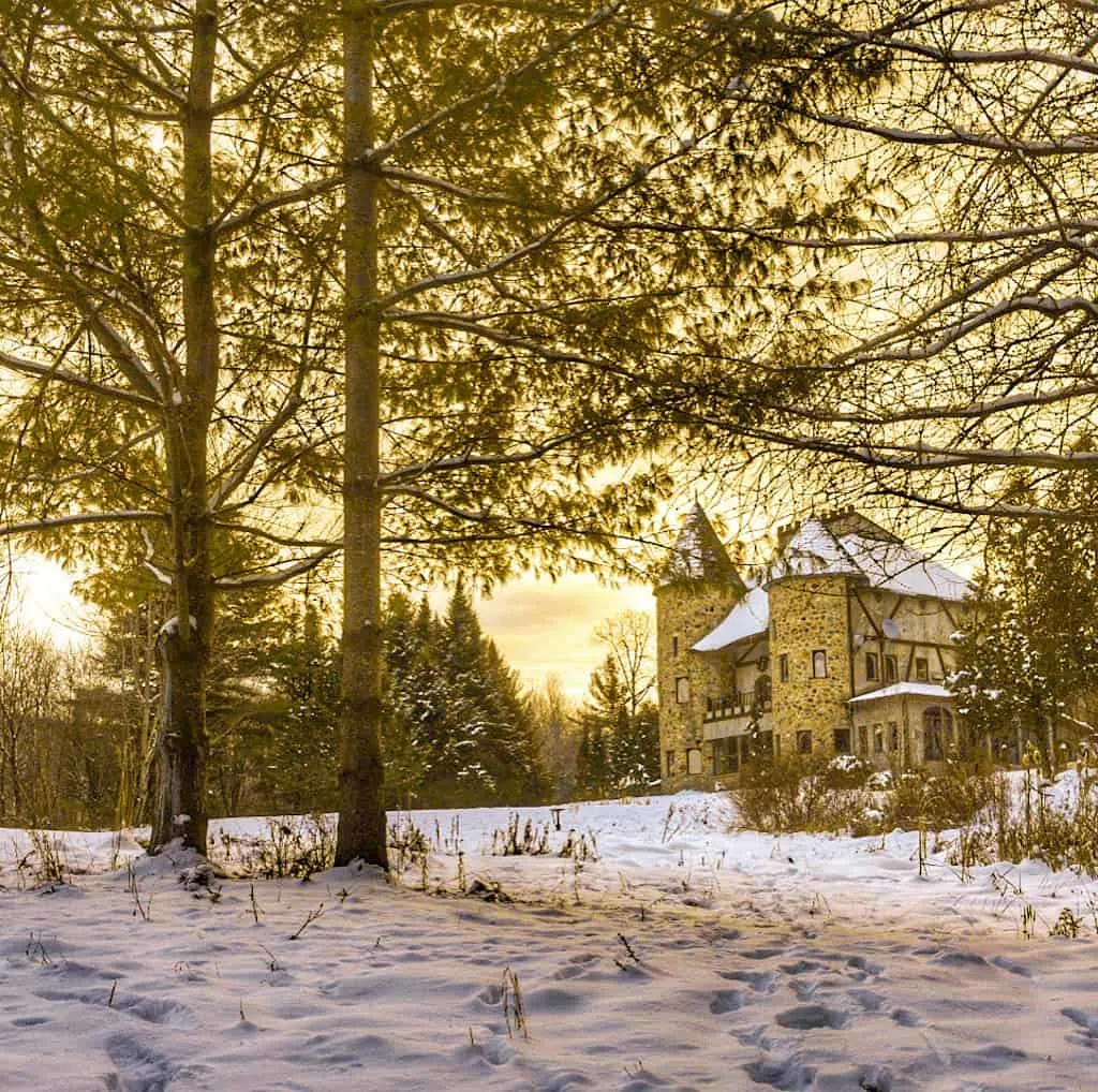 The back view of Gregoire Castle covered with snow.