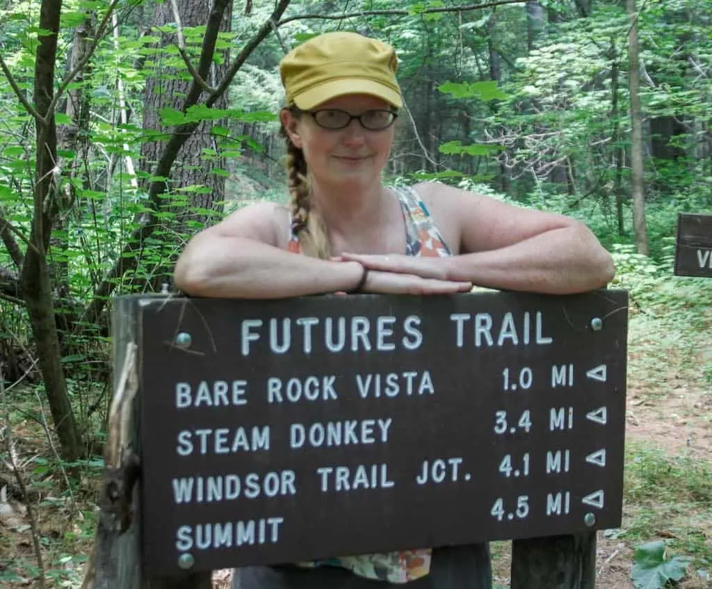 Me, posing with a trail sign at the Futures Trailhead in Mount Ascutney State Park.