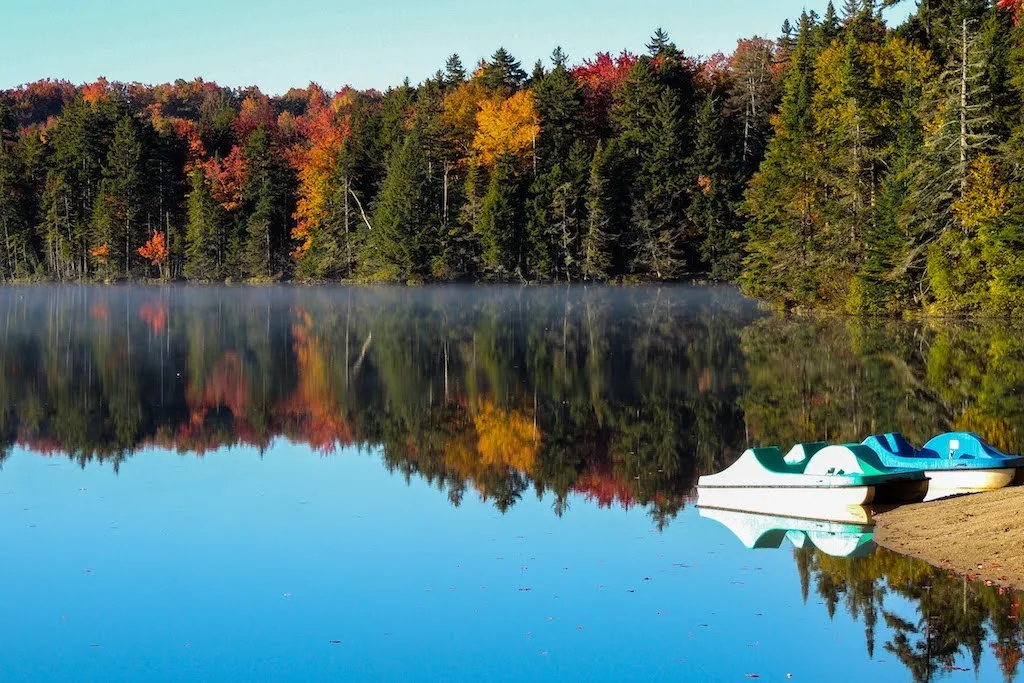 Fall foliage view on the lake in Woodford, Vermont.