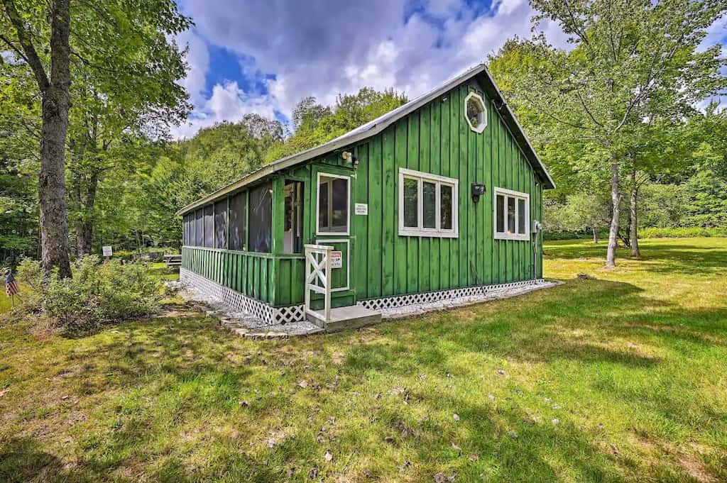 A green cabin for rent in Vermont's Northeast Kingdom.