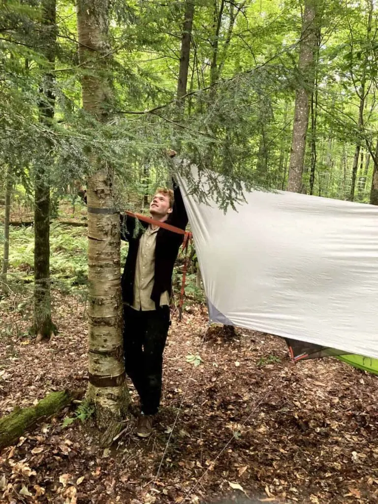 Rowan setting up his camping hammock in Gifford Woods State Park in Vermont.