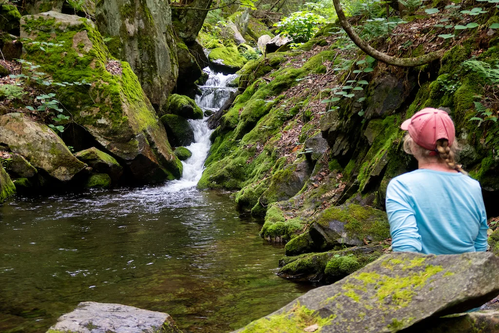 Tara looking at Irene Falls off Bucklin Trail in Killington. 