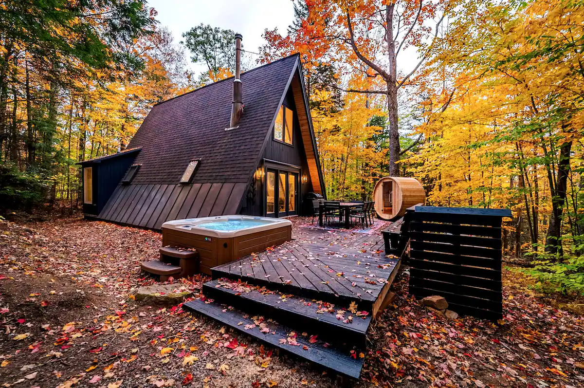 This beautiful A-frame has a hot tub and a barrel sauna. Photo credit: Airbnb