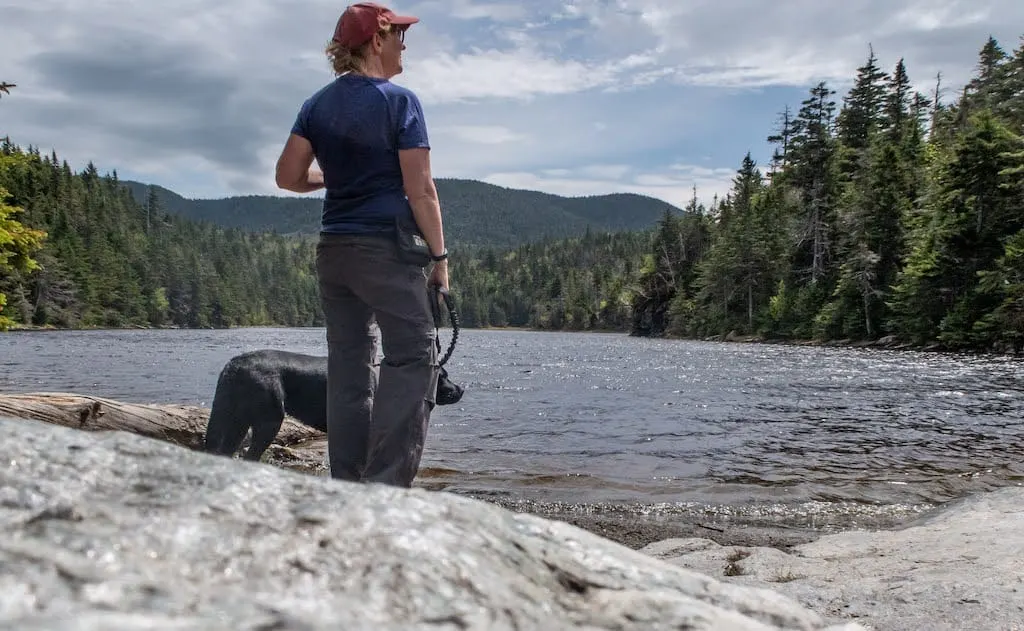 Tara stands near the edge of Sterling Pond in Stowe, VT. 