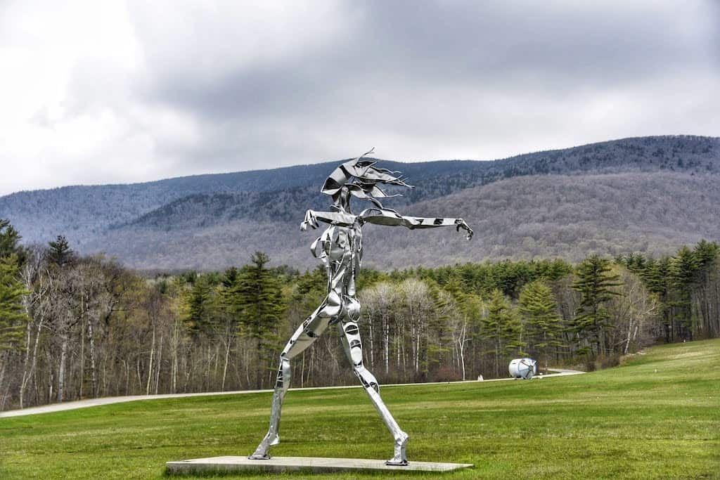 A larger-than-life metal sculpture of a woman at Southern Vermont Arts Center in Manchester, Vermont.