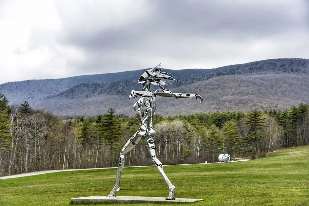 A larger-than-life metal sculpture of a woman at Southern Vermont Arts Center in Manchester, Vermont.