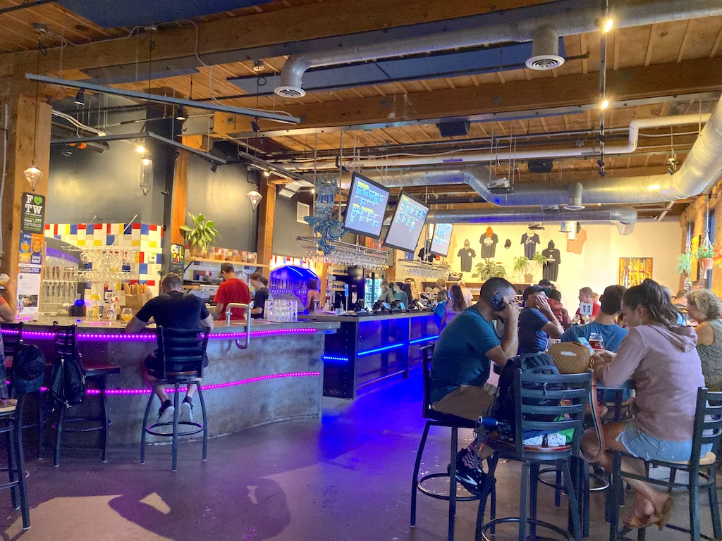 Patrons sit at the bar at Foam Brewers in Burlington Vermont.