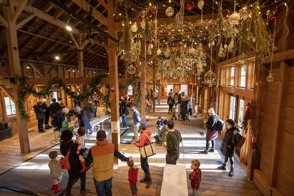 The historic barn decorated for Christmas at Billings Farm in Woodstock Vermont. 