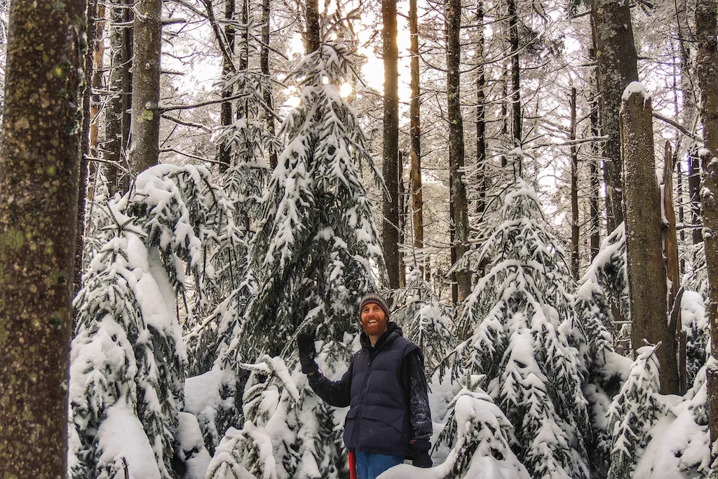 Eric standing with our perfect Christmas tree in the Green Mountain National Forest.