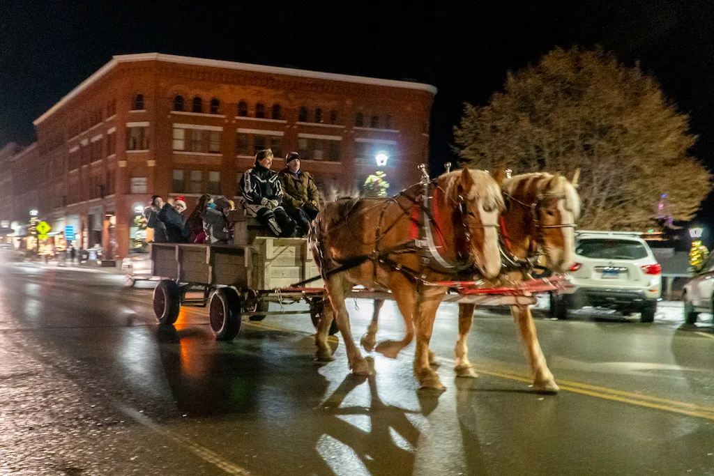 A horse-drawn carriage at St. J Sparkles in St. Johnsbury, Vermont.