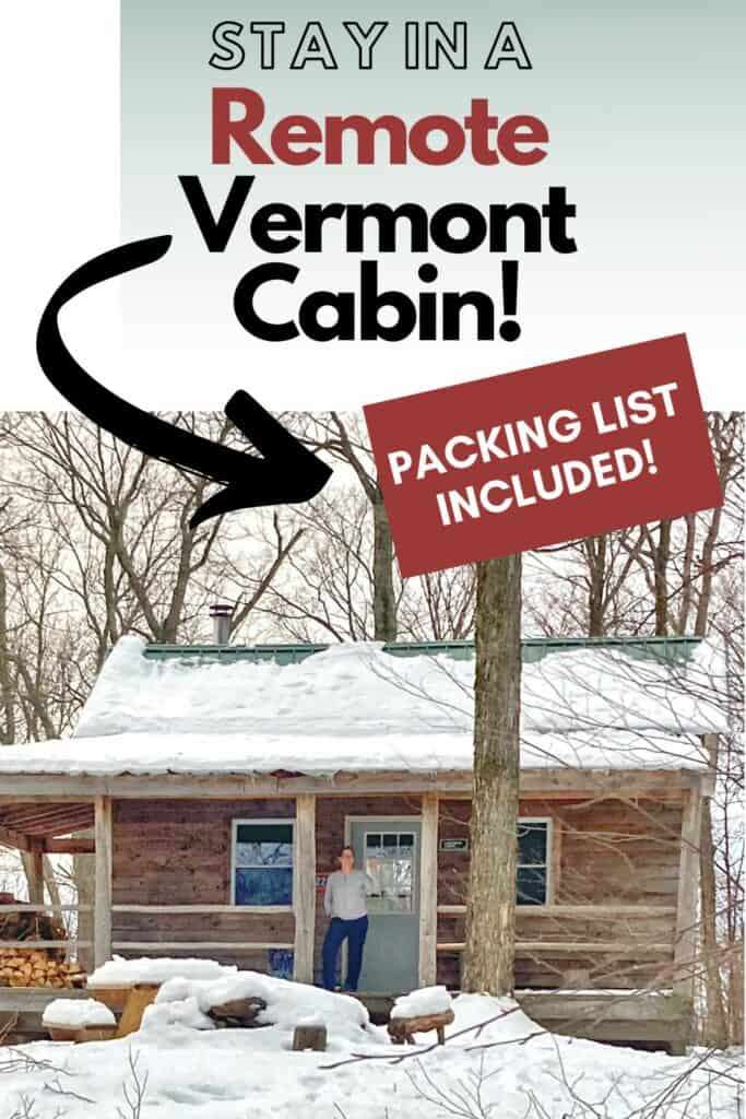 A remote camping cabin in Vermont covered with snow.