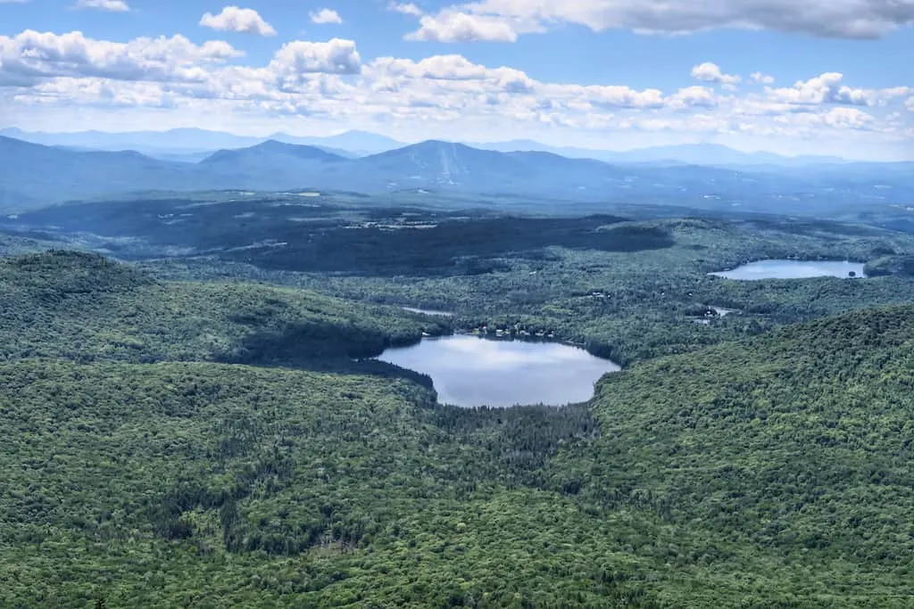 The view of several ponds and Burk Mountain from the top of the Bald Mountain fire tower in Vermont.