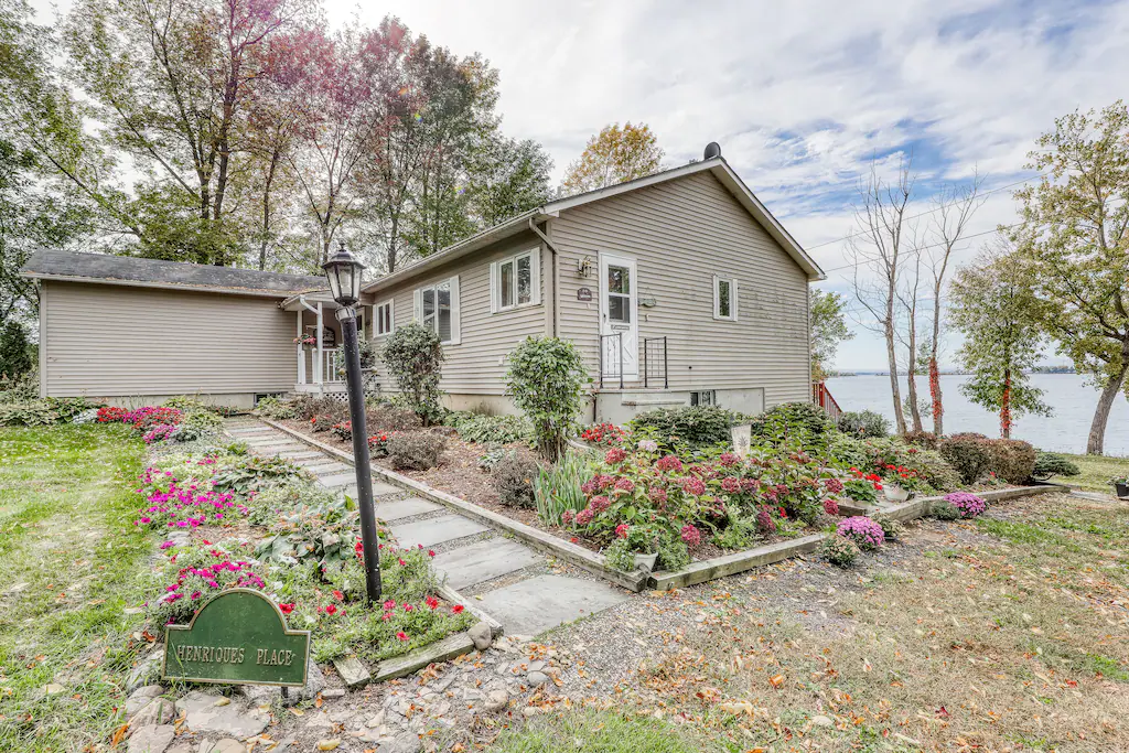 A Lake Champlain vacation rental surrounded by gardens.