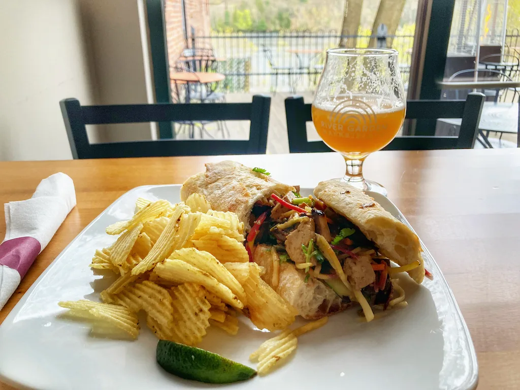 A sandwich, chips, and a beer at River Garden Marketplace in Brattleboro, VT.