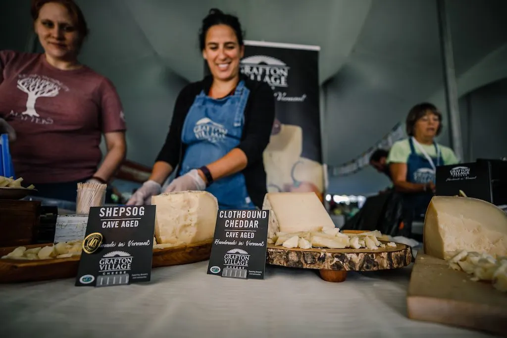 Cheesemakers offering tastings at the Vermont Cheesemaker Festival. 