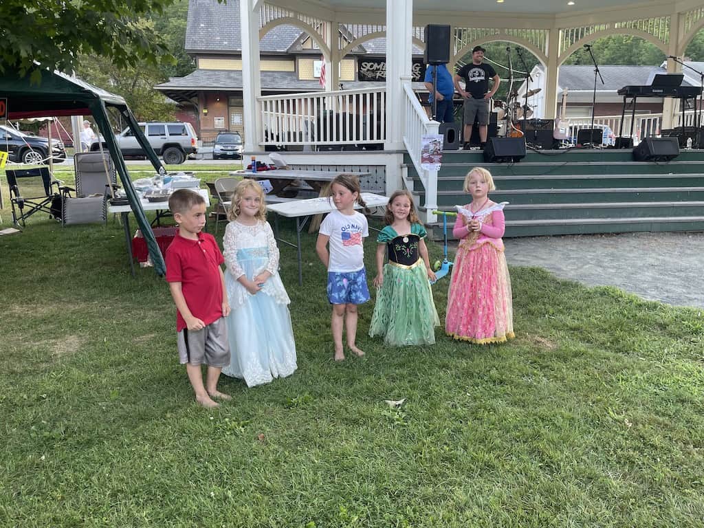 Kids dressed up for Royalton Old Home Days in front of the grandstand.
