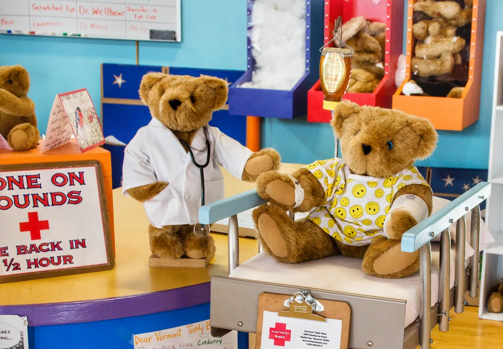 Two Vermont Teddy Bears waiting to be repaired at the Vermont Teddy Bear Factory.
