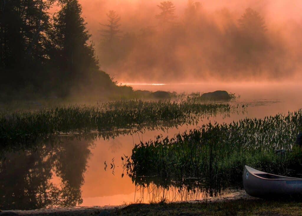 A foggy sunrise over a Vermont lake. 