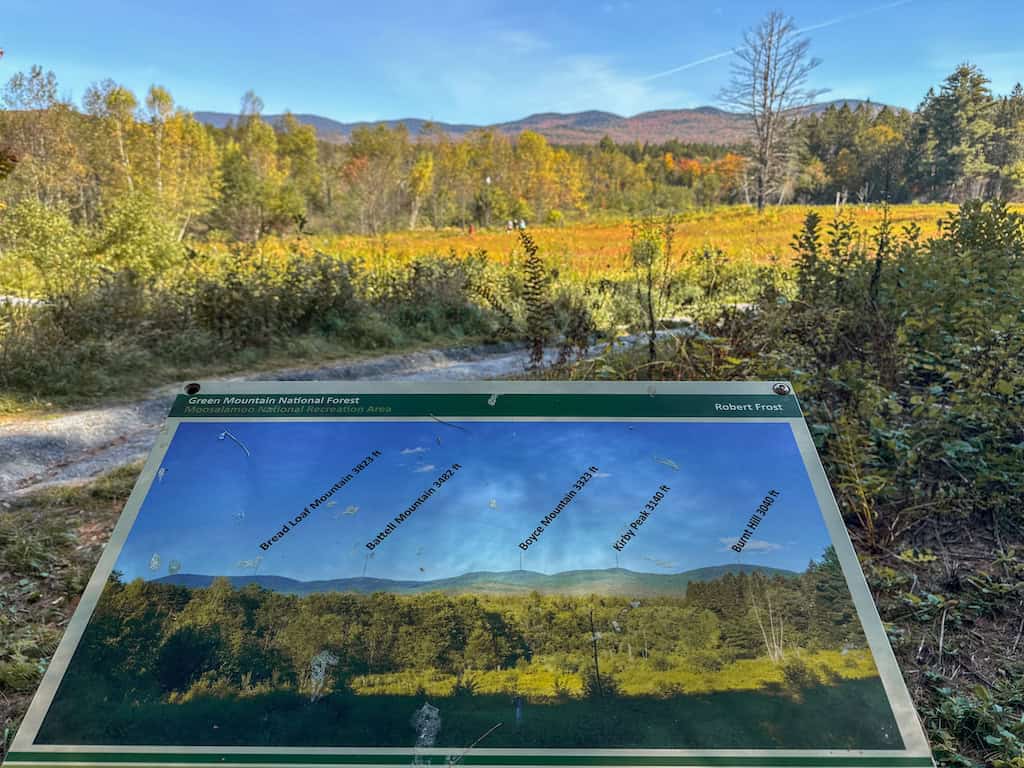 An interpretive sign showing the names of the distant peaks in the Green Mountains. 