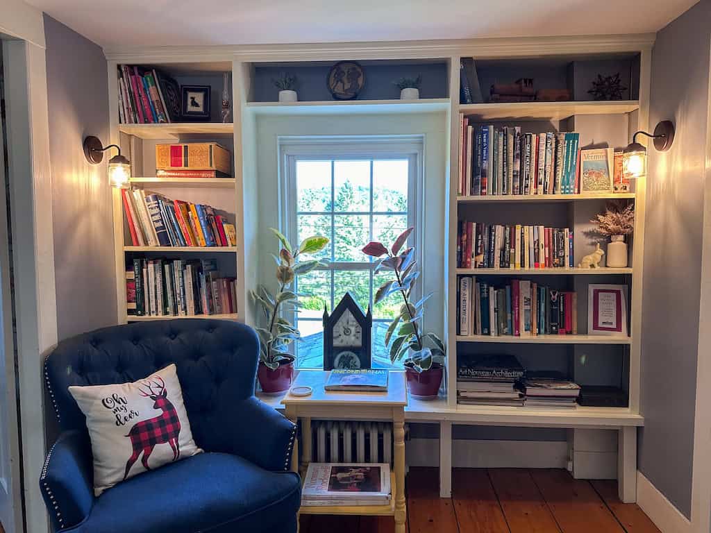 The upstairs reading nook has a great book collection.