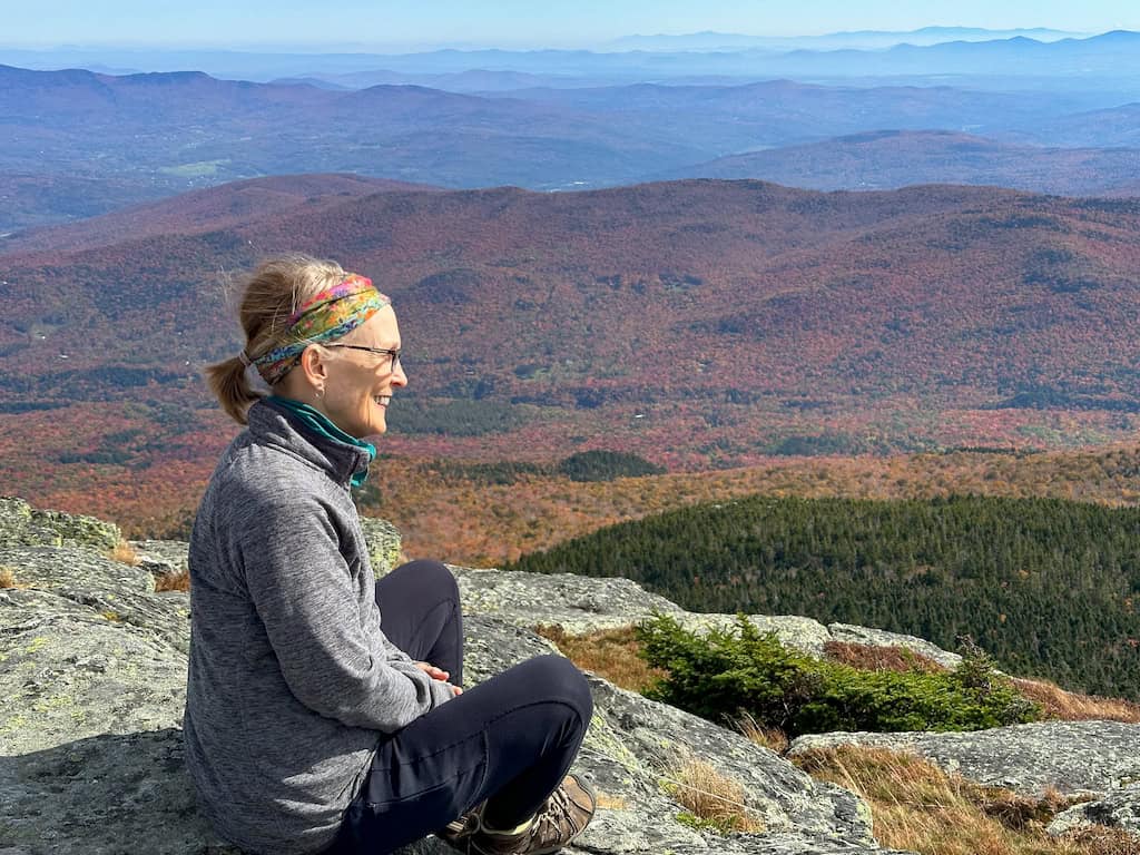 My friend Julie enjoying the fall views from the Camel's Hump summit. 