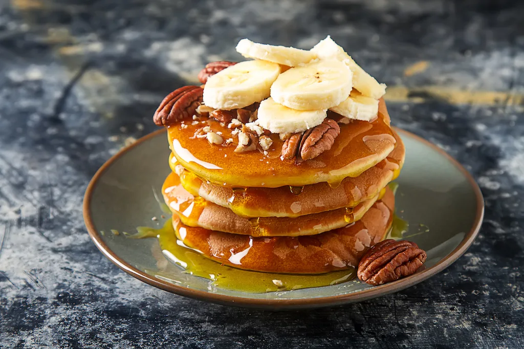 Banana nut pancakes with real Vermont maple syrup. 