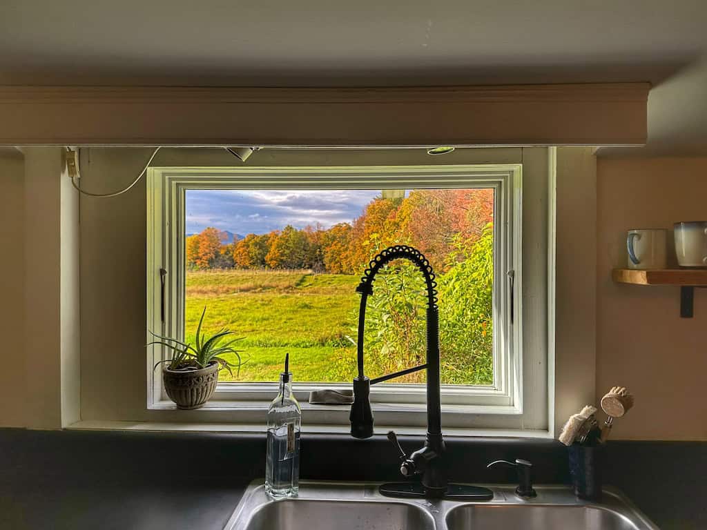 Fall foliage views from the kitchen sink in Elmore, Vermont.