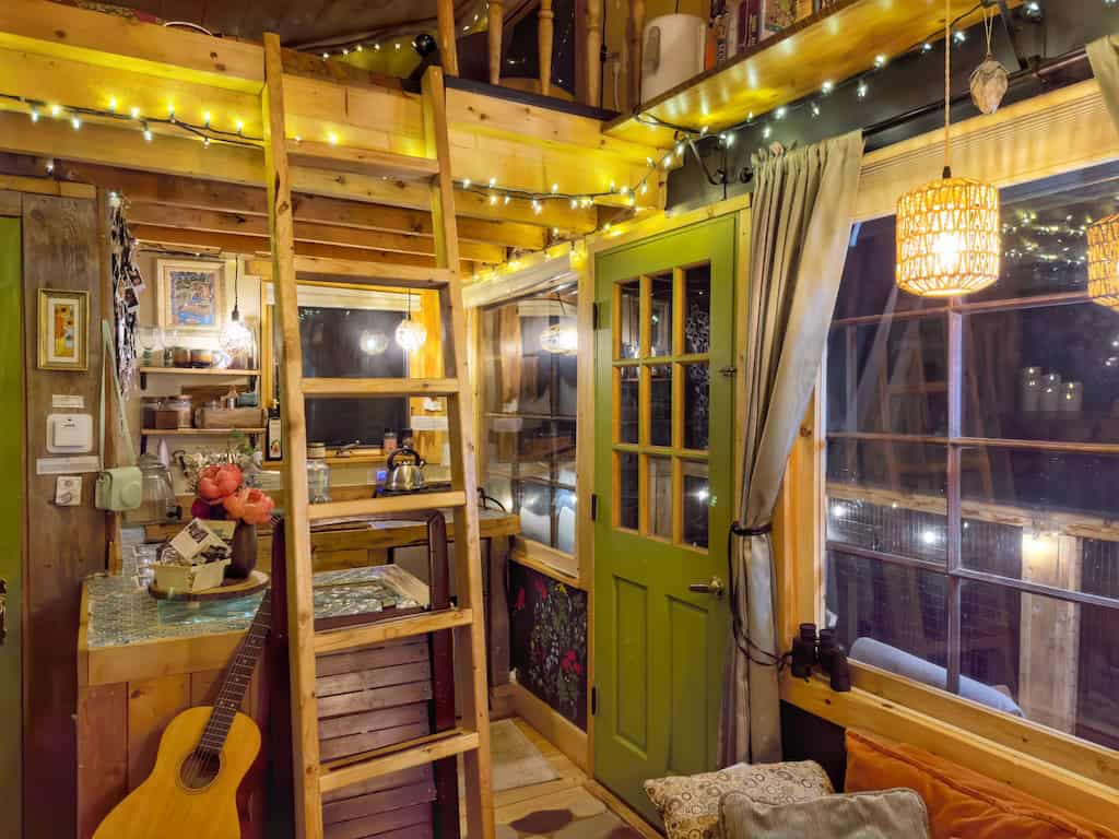 Small kitchen and a door leading to the balcony.