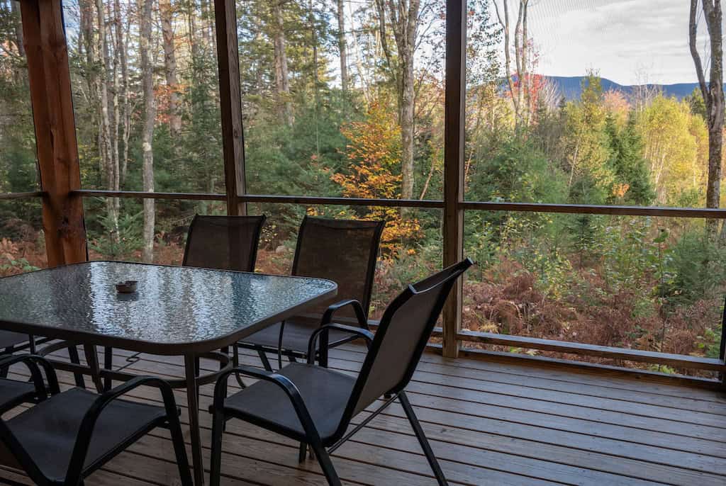 Screened-in-porch with a gorgeous mountain view.