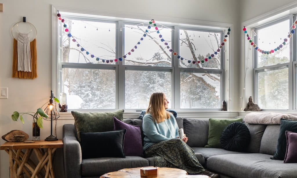 Watching the snow fall outside my window. 