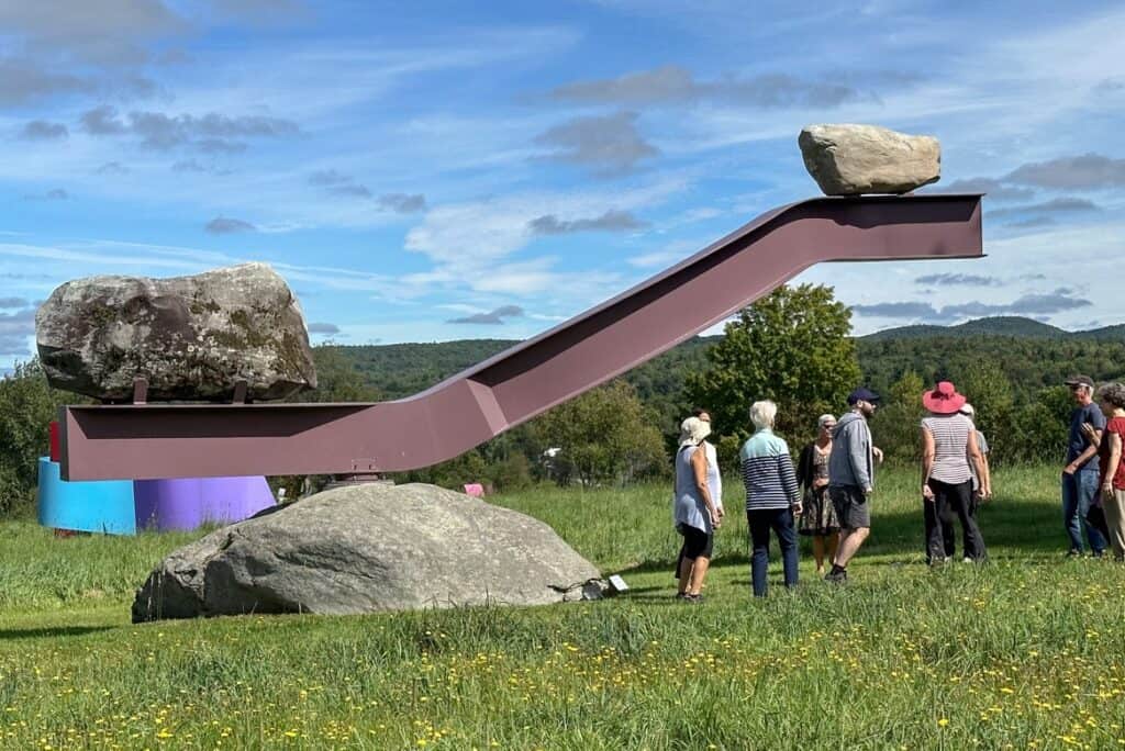 Visitors explore a sculpture in Cold Hollow Sculpture Park in Enosburg Falls, Vermont. 