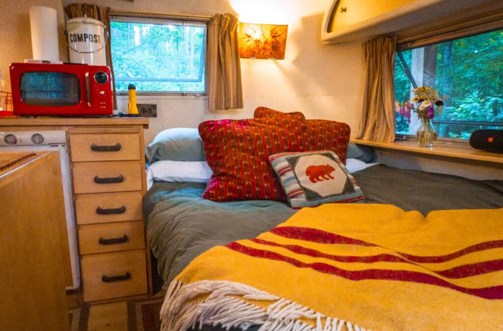 Double bed next to the kitchenette.
