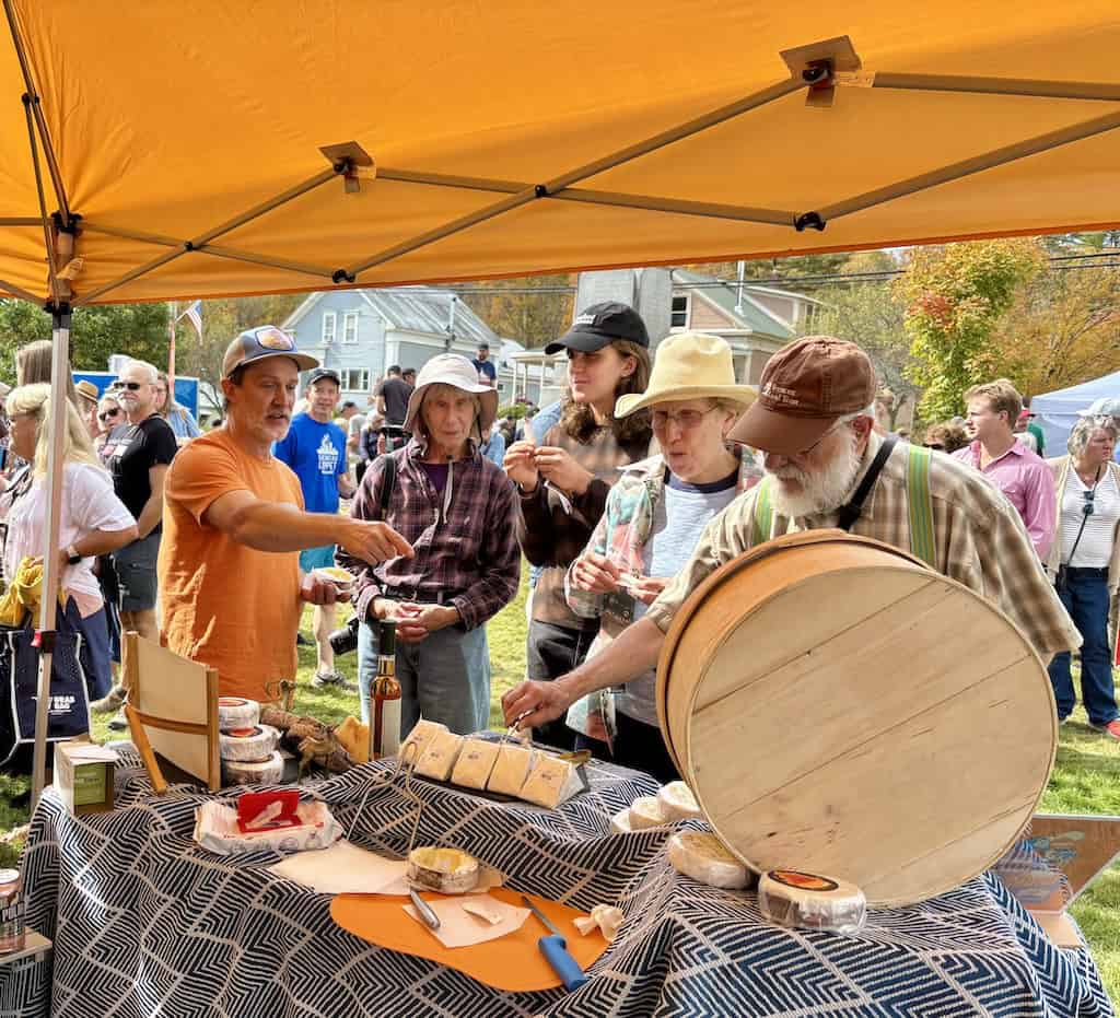 Participants tasting cheese at the Cabot Cheese and Culture Festival in Vermont.